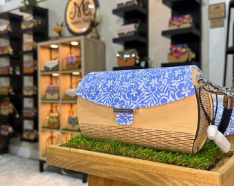 Introducing the Susy Handbag. A Hand crafted, classically elegant clutch style handbag made from wood.