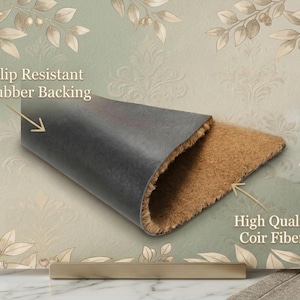 May include: A doormat with a brown coir fiber surface and a black slip-resistant rubber backing. The text "High Quality Coir Fibers" and "Slip Resistant Rubber Backing" are visible.