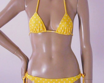 bikini She wore a yellow polka dot 38 New Porn Photos Female vibrator mpeg