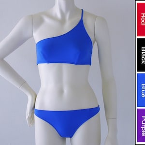 Top bikini asimétrico de un hombro y fondo de bikini brasileño en azul real, rojo, negro o púrpura en S.M.L.XL.