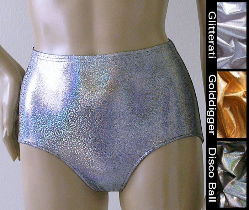 May include: High-waisted silver shorts with a shimmering, glittery finish. The shorts have a smooth, seamless design and a high-cut leg opening. The image also shows fabric swatches labeled Glitterati, Golddigger, and Disco Ball.