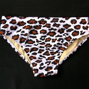 Mens Swim Brief Swimsuit in White Leopard Print