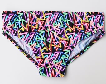 Mens Swim Brief Swimsuit in Regular or Low Rise in Neon Rave Print