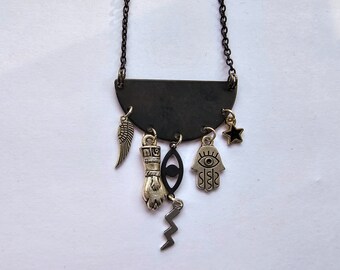 Talisman necklace. Multi charm necklace on 18" silver plated chain