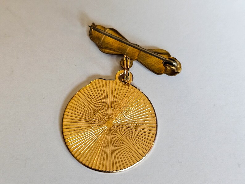 Astronaut enamel brooch on vintage brass bow pin image 2