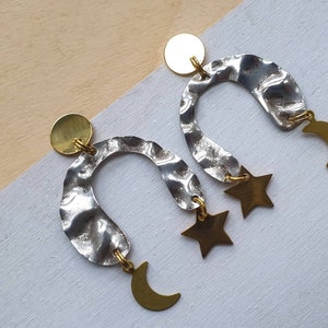 Selene night sky earrings. U shaped asymmetric arch earrings in silver and gold with moon and stars image 1