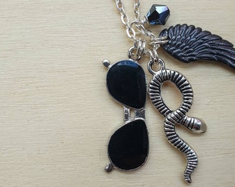 Crowley necklace| Charm necklace on 18"  silver finish chain with angel wing, snake and shades  Inspired by Good Omens.