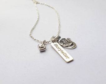 Storyteller (Pictures) necklace| Charm necklace with film reel and camera charms.