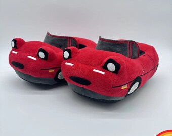 Race up your comfort with Miata Slipper Plush Toys! Soft, adorable, perfect for Mazda enthusiasts. Sporty style for cozy feet.