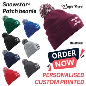 May include: A set of ten customisable beanie hats with pom-poms in various colours, including red, green, blue, grey, and black. Each hat features a blank patch for adding personalised text or a logo. The text "YOUR TEXT OR LOGO HERE" is printed on the patch of the burgundy beanie.