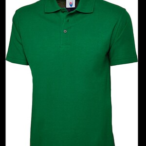 May include: A solid green short-sleeved polo shirt with a button-up collar.