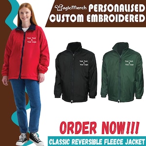 May include: A red, black, and green reversible fleece jacket with a zipper closure. The jacket has a personalized embroidered design with the text "Your Text & Your Logo".