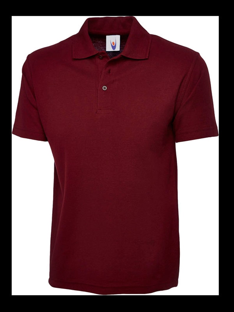 May include: A burgundy short-sleeved polo shirt with a button-up collar.