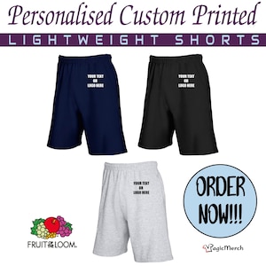 May include: Three pairs of lightweight shorts in navy blue, black, and heather grey. Each pair features an elastic waistband and a print area on the thigh with the text "YOUR TEXT OR LOGO HERE". The image includes the text "Personalised Custom Printed LIGHTWEIGHT SHORTS" and "ORDER NOW!!!" along with a Fruit of the Loom logo.