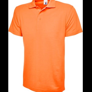 May include: A bright orange short-sleeved polo shirt with a button-up collar.