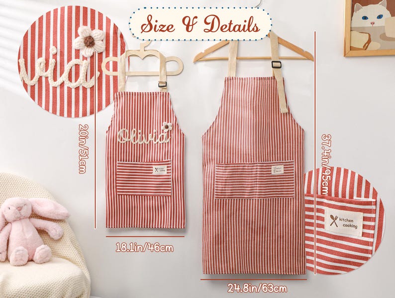 May include: Red and white striped aprons, one adult size (37.4in/95cm) and one child size (20in/51cm), hang on a wall. The aprons have pockets and the text "Olivia" is embroidered on the child's apron. The adult apron has the text "kitchen cooking" on the pocket.