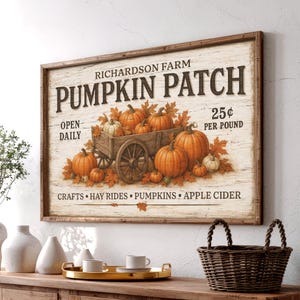 May include: Wooden sign with the text "Richardson Farm Pumpkin Patch" featuring a vintage illustration of pumpkins and a wooden cart. The sign also includes the text "Open Daily" and "25¢ per pound."