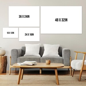 May include: A living room with a gray couch, a coffee table, and a chair. There are four white frames on the wall with the dimensions 18 x 12 in, 24 x 16 in, 36 x 24 in, and 48 x 32 in.