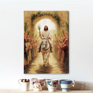 May include: A painting depicting Jesus riding a white horse through a gateway, surrounded by people waving palm branches. The scene is set in a city with buildings and a bright sky.