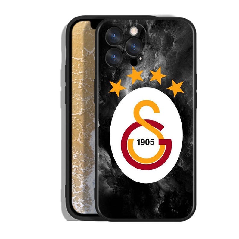 Pode incluir: Capa de telefone preta com fundo marmorizado e o logotipo do Galatasaray. O logotipo apresenta um oval branco com um design amarelo e vermelho e cinco estrelas douradas. O ano "1905" est&aacute; impresso no logotipo.