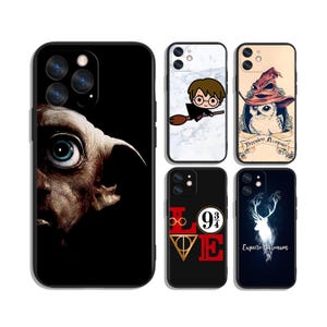 May include: Collection of black phone cases featuring various designs. One case displays a close-up of a character's eye, while others showcase Harry Potter-themed graphics, including a cartoon Harry on a broom, an owl with a sorting hat, and the words "LOVE 9 3/4".