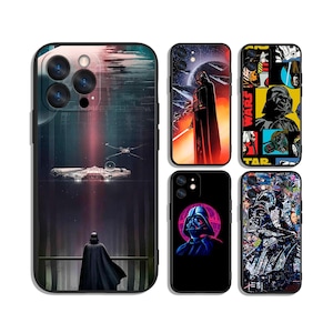 May include: A collection of phone cases featuring Star Wars-themed designs. The cases showcase Darth Vader, space battles, and other iconic imagery from the franchise. The cases are black and have a glossy finish.