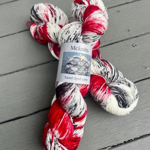 Hand Dyed Sock Yarn: Sleighbells and Cinders, Red Black Speckled