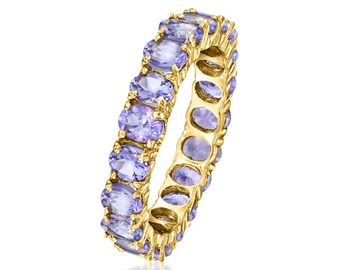 Anillo de compromiso ovalado de tanzanita en oro de 14k, estilo eternidad.