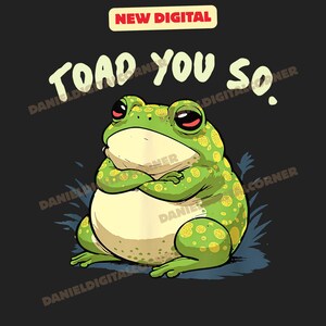May include: Digital illustration of a green frog with yellow spots, arms crossed, and a grumpy expression. Text reads "TOAD YOU SO." The image has a black background and a "NEW DIGITAL" banner.
