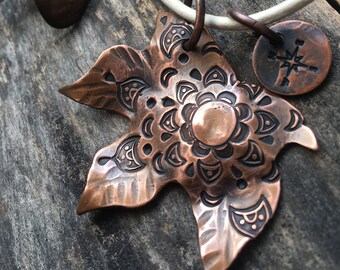 Mandala Inspired Stamp Maple Leaf Copper Pendant, Leather Knotted Cord and artisan closure