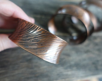 Copper Bark Textured Cuff with 'always more' hand stamped on the side edge