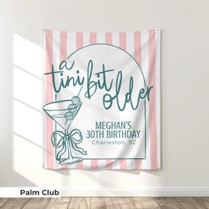 Martini-themed birthday backdrop with a bold 'Tini Bit Older' slogan, made for cocktail-themed bashes. Whether you're hosting a 30th or 40th birthday party, this banner is a great way to welcome guests to your dirty martini or tini bit toasted celebration.