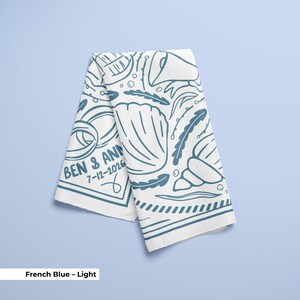 A French Blue coastal wedding handkerchief scarf personalized with names or roles, decorated with seashell patterns and wedding-inspired accents, created for bridal party gifting, bachelorette celebrations, or wedding guest favors, offering a cohesive and stylish accessory option.