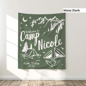 Durable and large camp bride tapestry sign, designed for outdoor bridal bash weekends. Use as a photo backdrop, tent decoration, or cabin banner to elevate your mountain bachelorette aesthetic.
