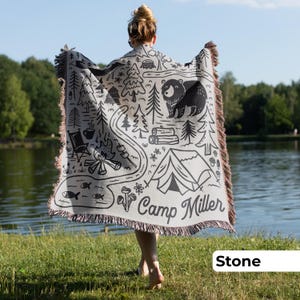 Custom name woven tapestry blanket with fringe trim, ideal for nature-loving families and adventure-seeking couples who cherish their time outdoors.