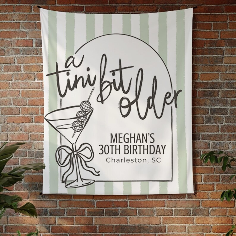 Fun and elegant martini-themed birthday sign for a cocktail celebration with espresso martinis or dirty martinis. Ideal for a 30th birthday bash, this large 'Tini Bit Older' banner adds personality and sass to your birthday backdrop.