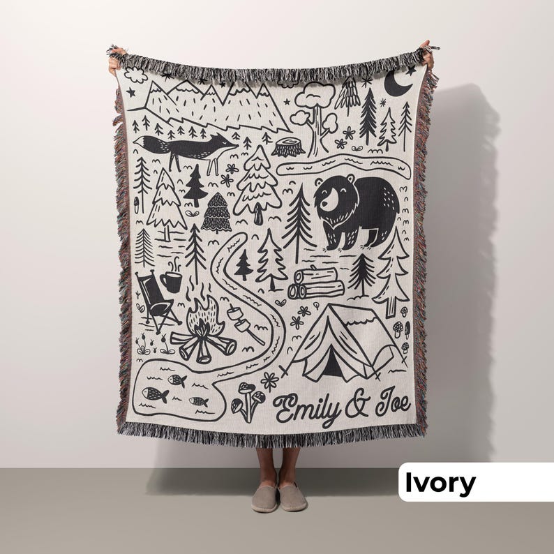 Man holding custom camping throw with unique outdoor design in ivory, a great camping gift for couples or an outdoorsy couple wedding gift idea.