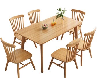 Juego de comedor de madera de 4 y 6 plazas.