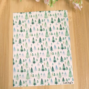 May include: A white background with a repeating pattern of green watercolour trees. The text "CamClayCo" is in the bottom right corner.