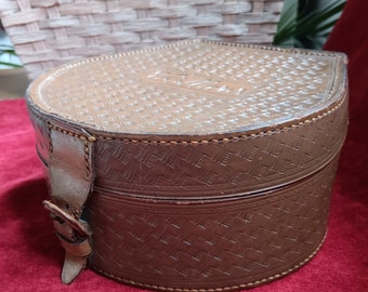 vintage horseshoe shaped leather collar box with basket weave design.