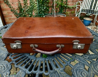 Leather suitcase. Vintage luggage .