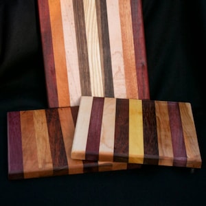 handmade 10 x 8.5  cuttingboard/chopping trivet Butcher block cheese board made from domestic and exotic woods.i will pick one out of stock