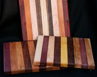 8x8.5" cutting board/butcher block made from different woods from around the world.  i will pick one out and send it to you