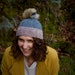 Naomi Searl reviewed Unisex Hand knit beanie - winter wool hat with faux fur pom pom - Fall Winter Toque - Winter toque for women and men - Minimalist winter hat