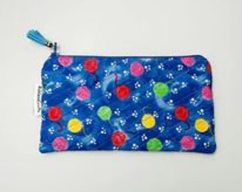 Colorful Balls of Yarn on Blue Quilted Zipper Pouch