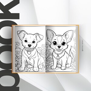 以下が含まれることがあります： 黒と白の塗り絵のページには、2匹のかわいい漫画の犬が描かれています。犬は花畑に座っています。本は犬が描かれたページを開いています。ページの右側に「@Elite retail」というテキストが印刷されています。