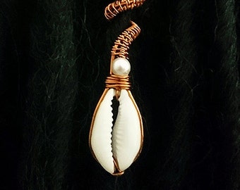 ROYAL - Cowrie and Pearl woven copper hair cuff.