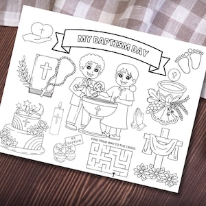 May include: Black and white illustration of a baptism-themed coloring page. The page includes images of a baptismal font, a cake, a cross, a bible, and the text "MY BAPTISM DAY" and "FIND YOUR WAY TO THE CROSS".