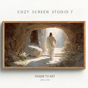 May include: A framed print of a religious scene. A figure in white robes walks toward the light at the end of a stone tunnel. The print is in a wooden frame. The text "COZY SCREEN STUDIO 7" and "FRAME TV ART" are at the top and bottom.