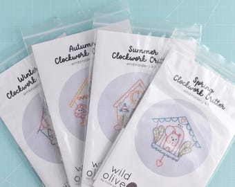 Clockwork Critters Embroidery Kit - Pre-printed Fabric with Animals on Seasonal Clocks